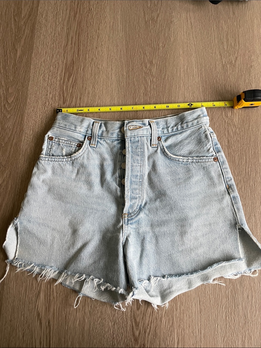 Agolde Dee High-Rise Light Wash Denim Shorts with Frayed Hem